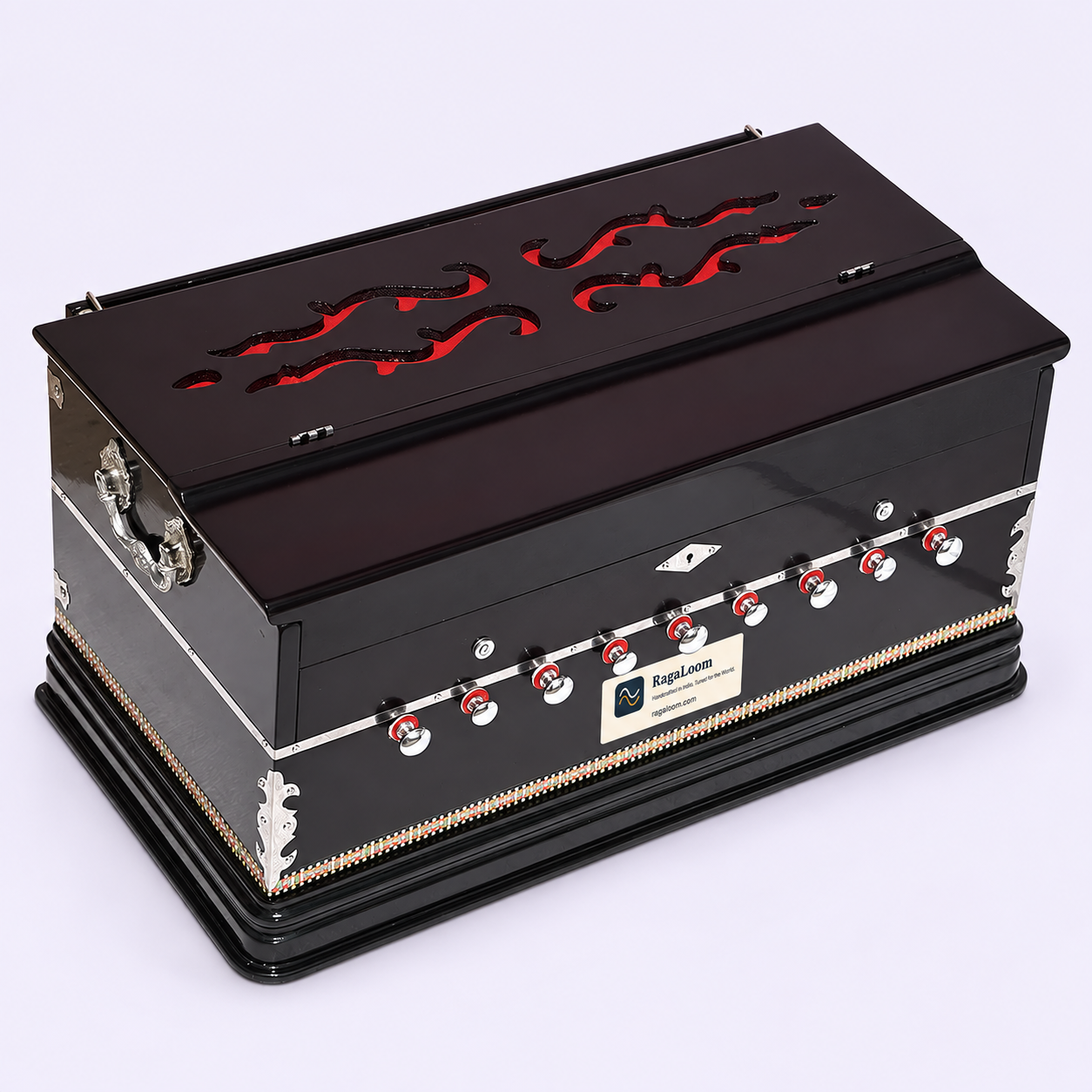 Magic Voice dark mahogany harmonium closed, showing cabinet and front stops
