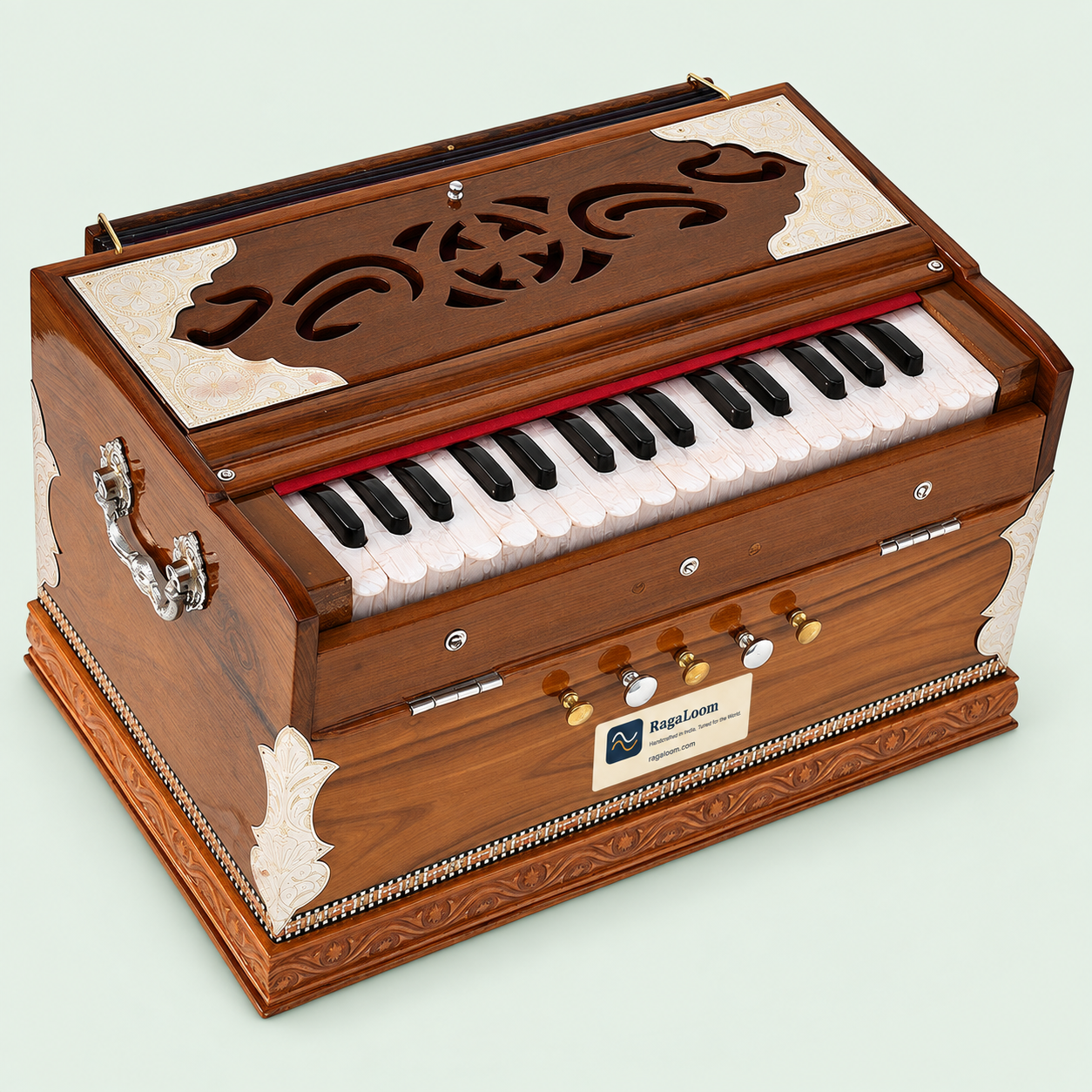 Mini Magic teak harmonium, 32 keys and four stops, front-left angle