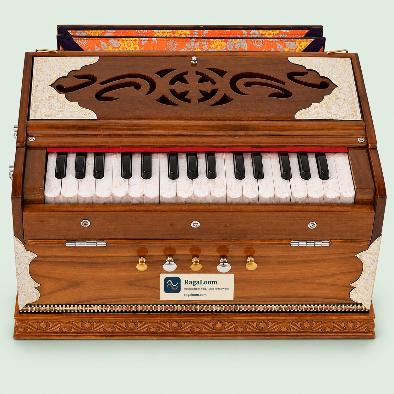Mini Magic teak harmonium with 32-key keyboard and four stops, straight-on front view