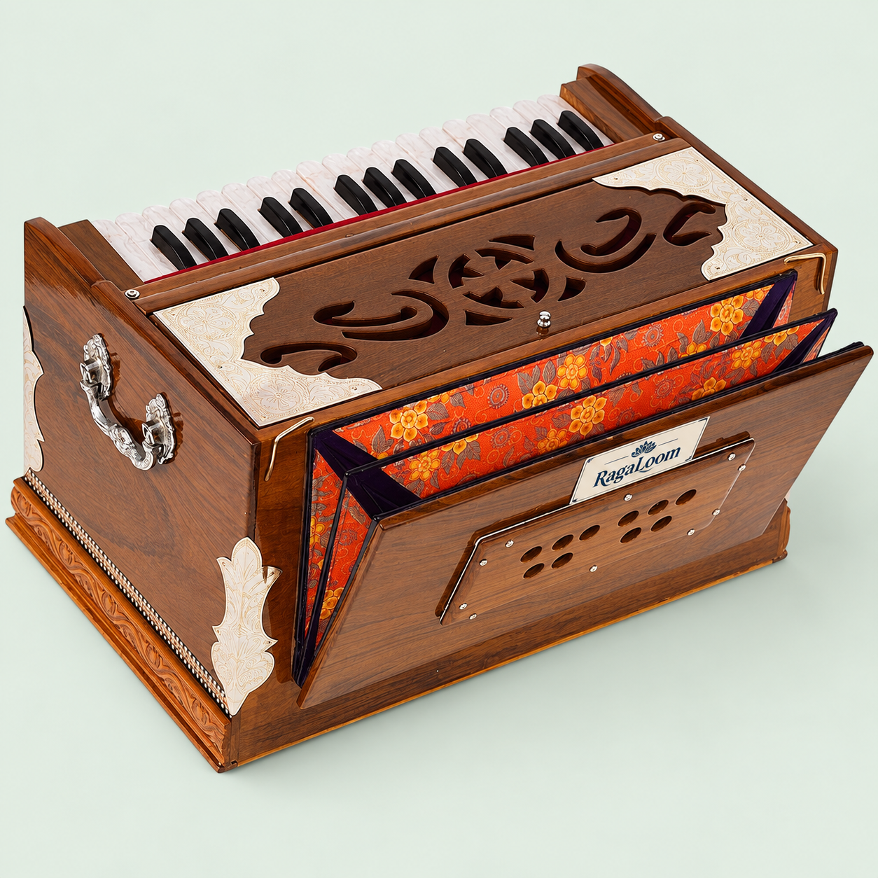 Rear three-quarter view of Mini Magic teak harmonium with colorful double-fold bellows open