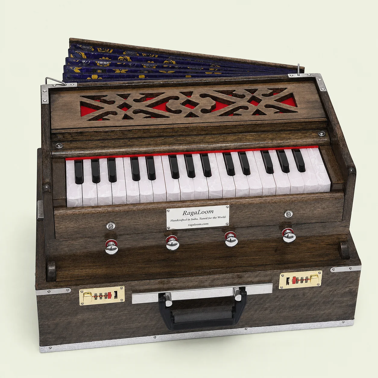 RagaLoom oak-finish Mini Traveler harmonium in portable case, angle view