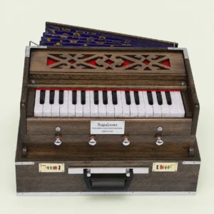 RagaLoom Mini Traveler harmonium with 32 keys and four stops, front view