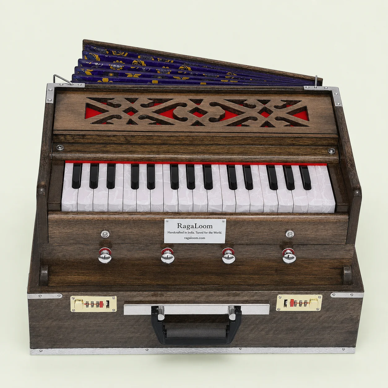 RagaLoom Mini Traveler harmonium with 32 keys and four stops, front view