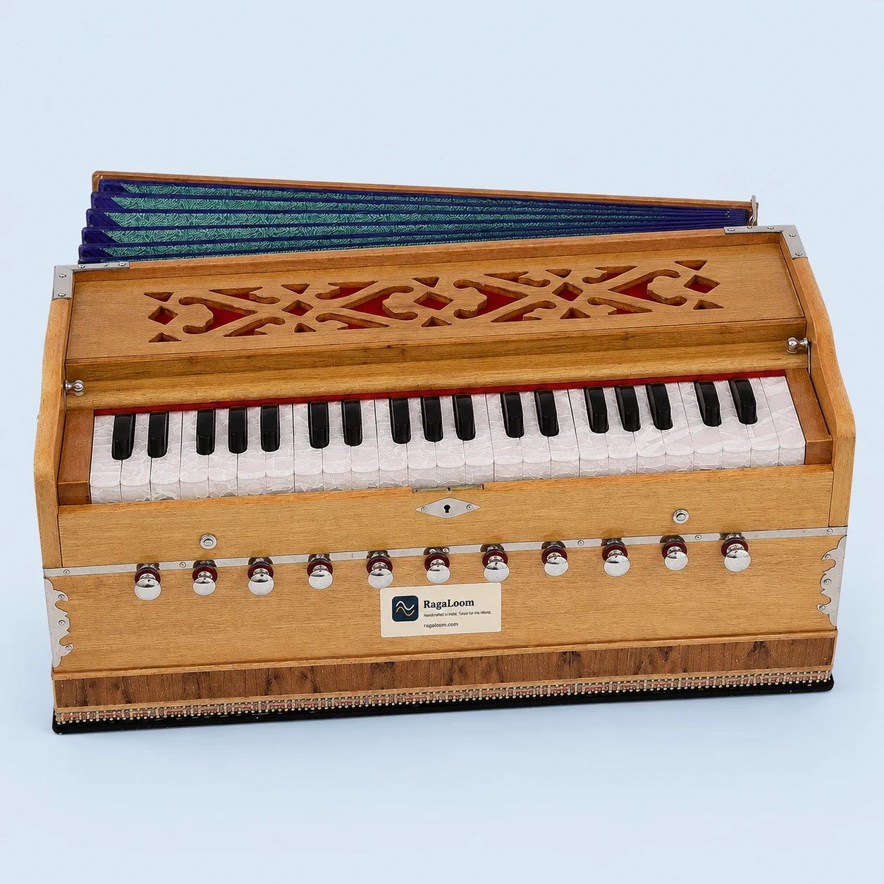 Pro-grade teak harmonium with 11 stops, straight front view