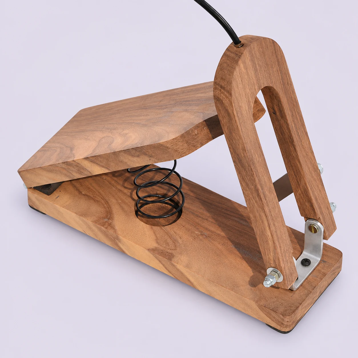 Wooden shruti box pedal with treadle, spring and cable from above