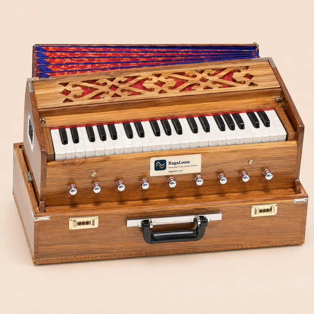 Teak folding traveler harmonium with 9 stops, front view