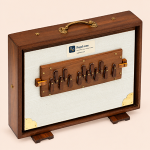 White floral teak shruti box, 13-note front view with RagaLoom label on pale peach background