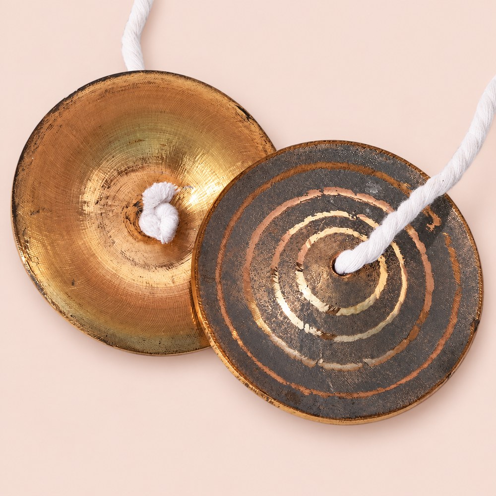 Handmade bronze manjira cymbal pair with white cotton holding cords