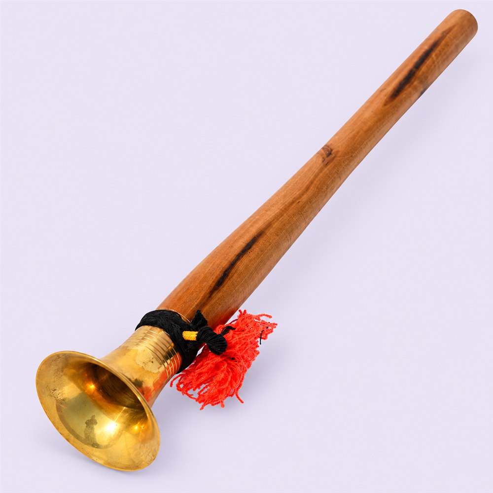 Teak shehnai reverse view with brass bell and red tassel